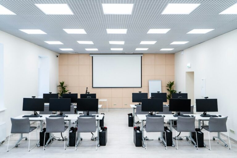 Smart classroom with a large display and computers